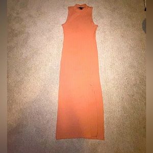Stretchy , cotton , tight fitted Sun dress with slit .
